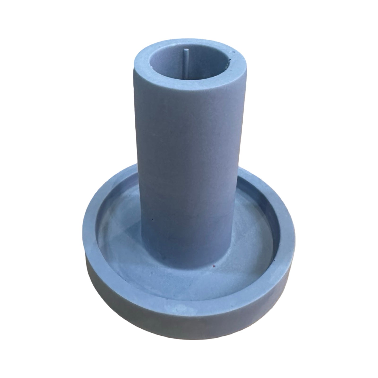 A purple cylindrical dinner candle holder with a lip around the bottom to catch any drips.
