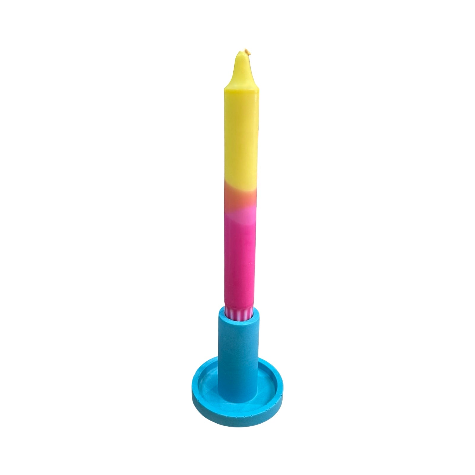 A turquoise cylindrical dinner candle holder with a lip around the bottom to catch any drips holding a yellow and pink dinner candle.