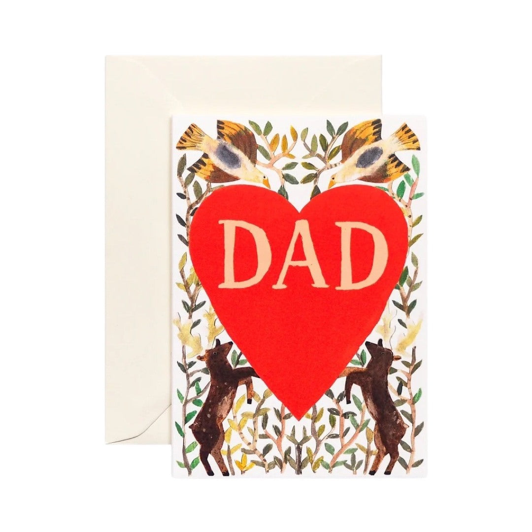 Card for dad featuring a giant red love heart with the text 'DAD' in the centre surrounded by flying birds, leaping deers and foliage