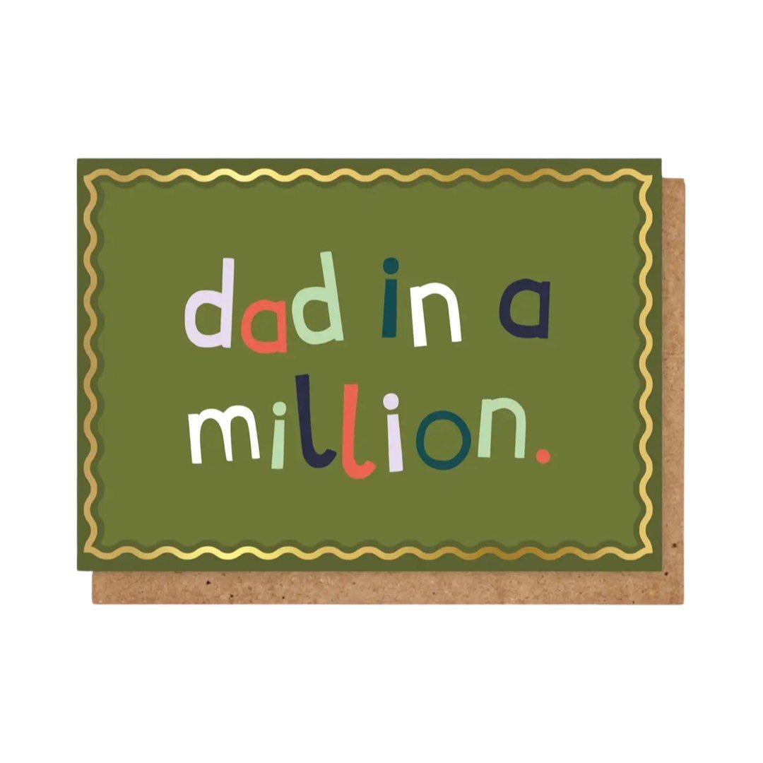 Card featuring the text 'Dad in a Million' in multicoloured text against a green background.