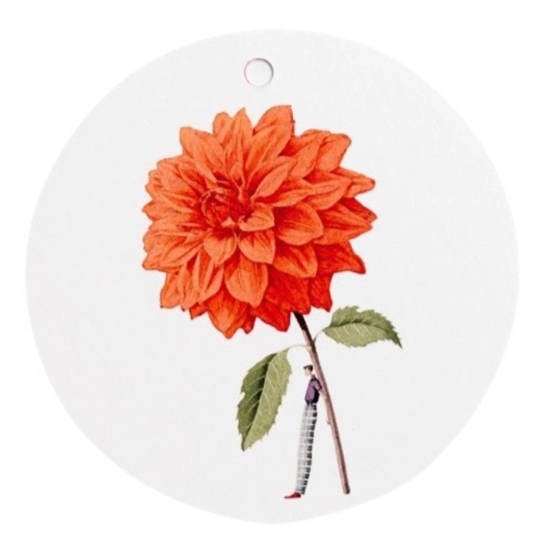 Decorative gift tag with an orange flower on a white background.