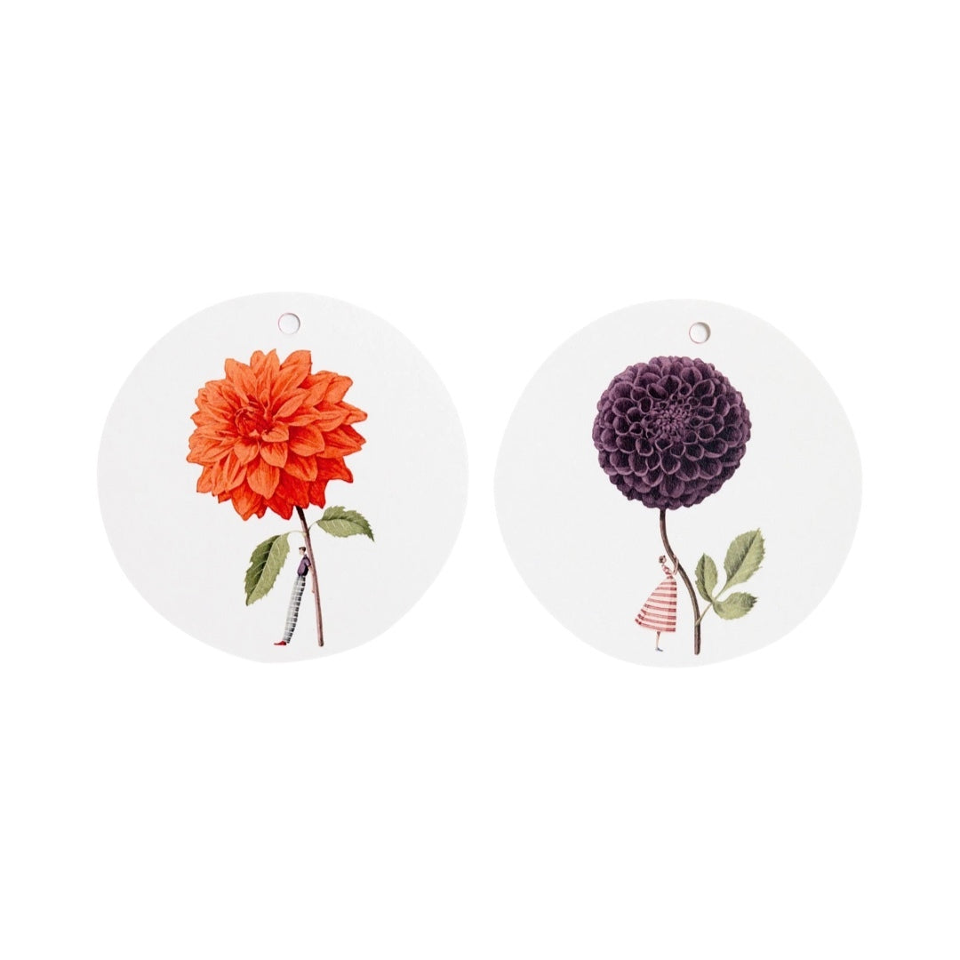 2 gift tags, one with an orange dahlia flower and one with a purple dahlia flower.