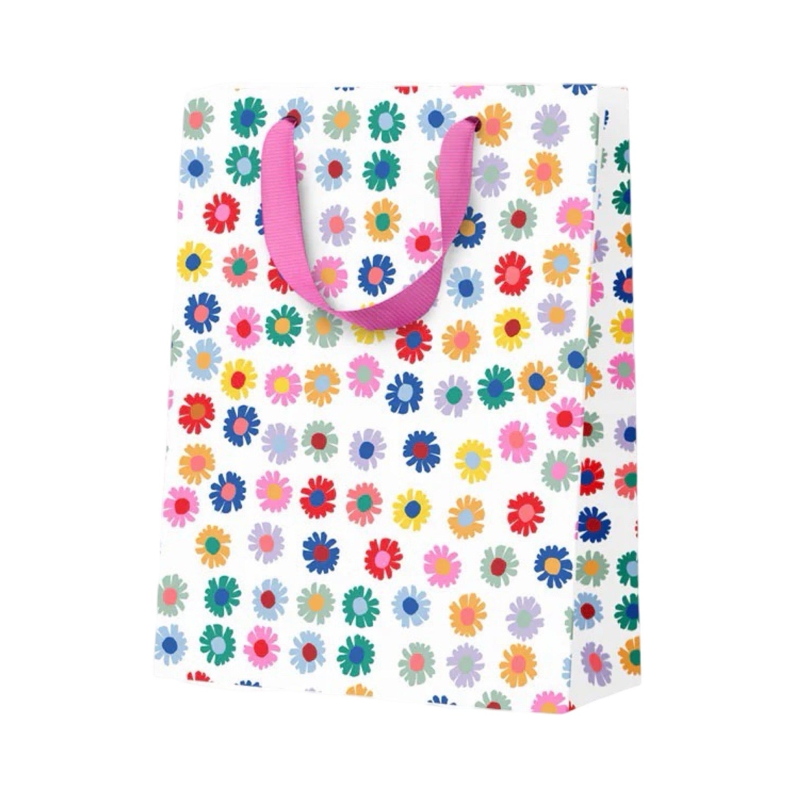 A white paper gift bag decorated with a colorful pattern of small daisy-like flowers and featuring pink handles, shown on a plain white background.