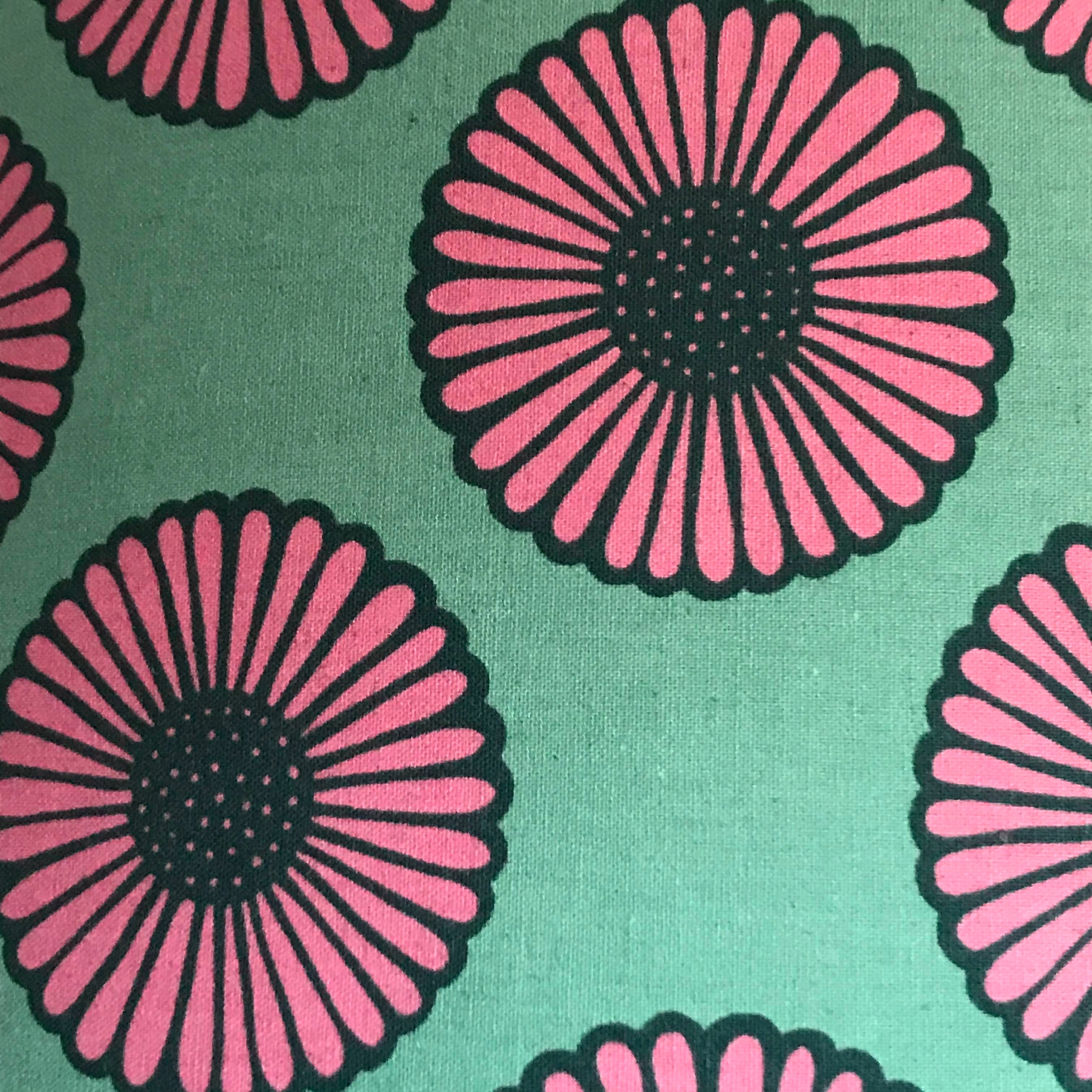 Aqua canvas fabric with pink and black daisies