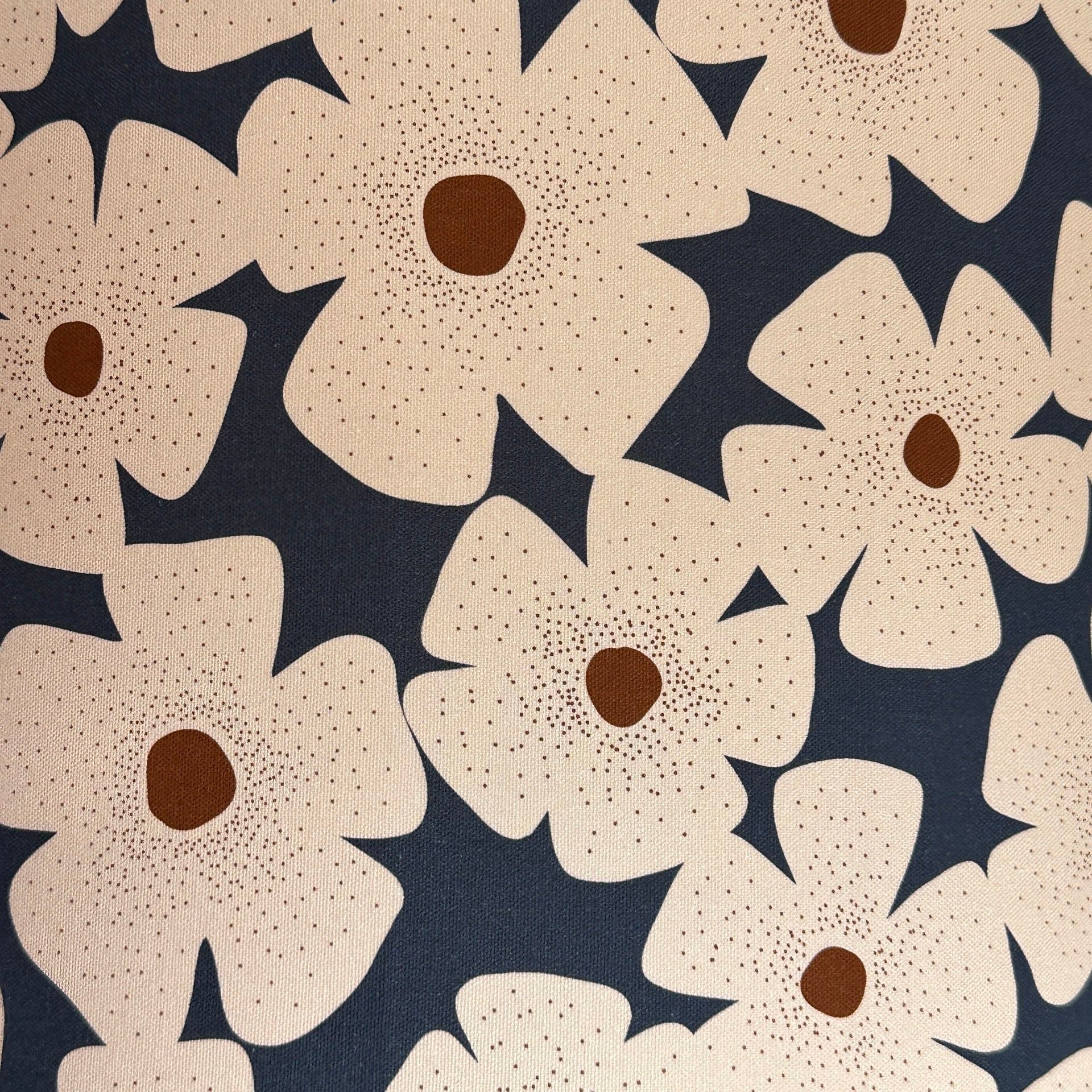 navy canvas fabric with white and mustard daisies.