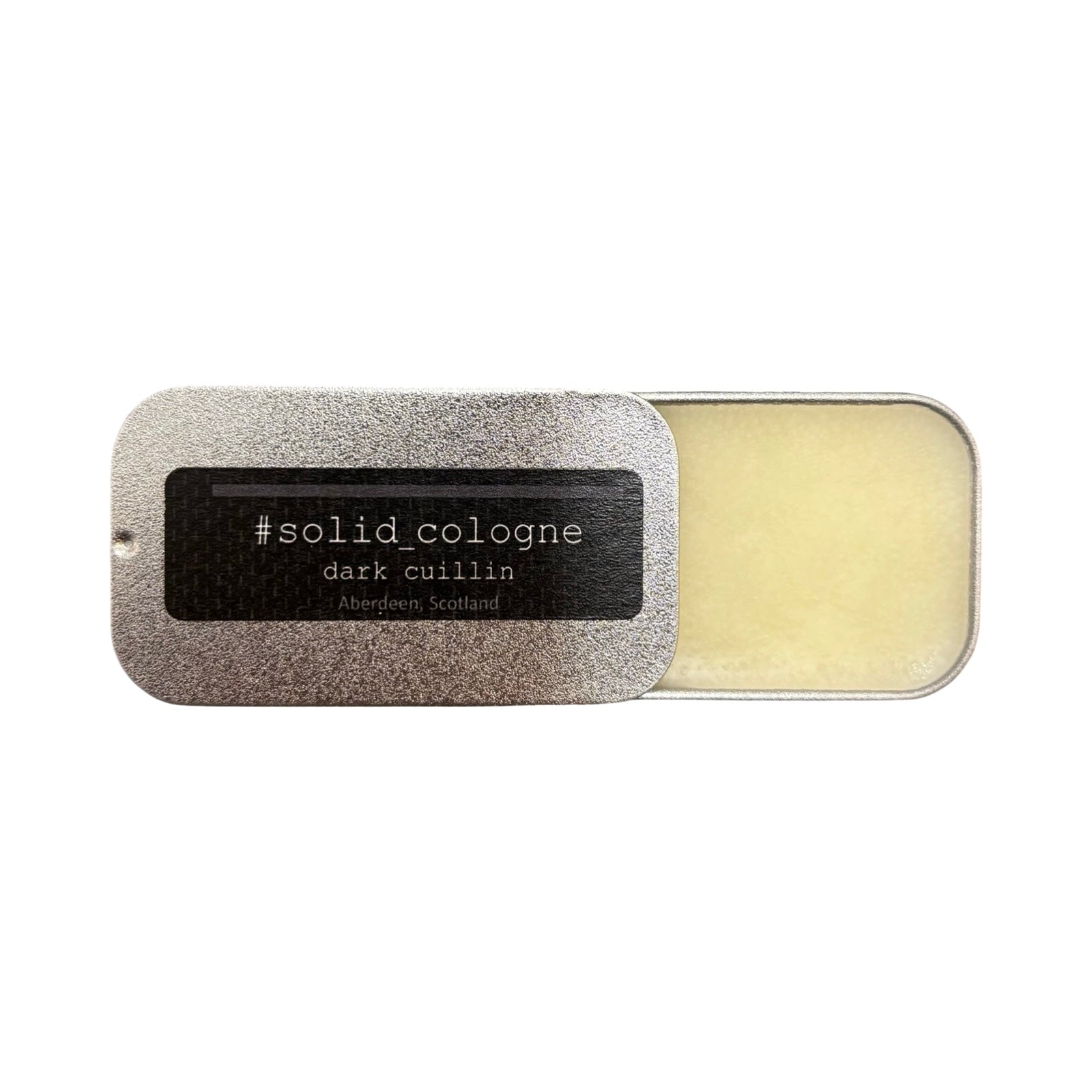 Dark Cuillin Solid Cologne, a&nbsp;spicy opening with bergamot, ginger, pepper, clove, cassis, plum and coconut leading to a heart of jasmin and violet on a rich base of, sandalwood, cedarwood, amber, musk, tonka and vanilla, all in this little tin.