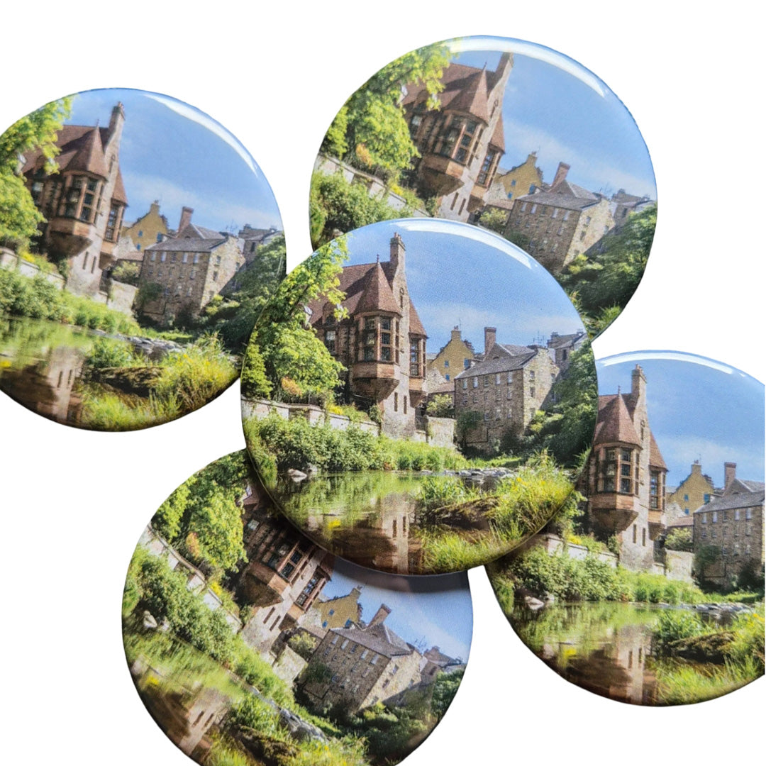 Round magnets with a picture of Dean Village Edinburgh on them. 