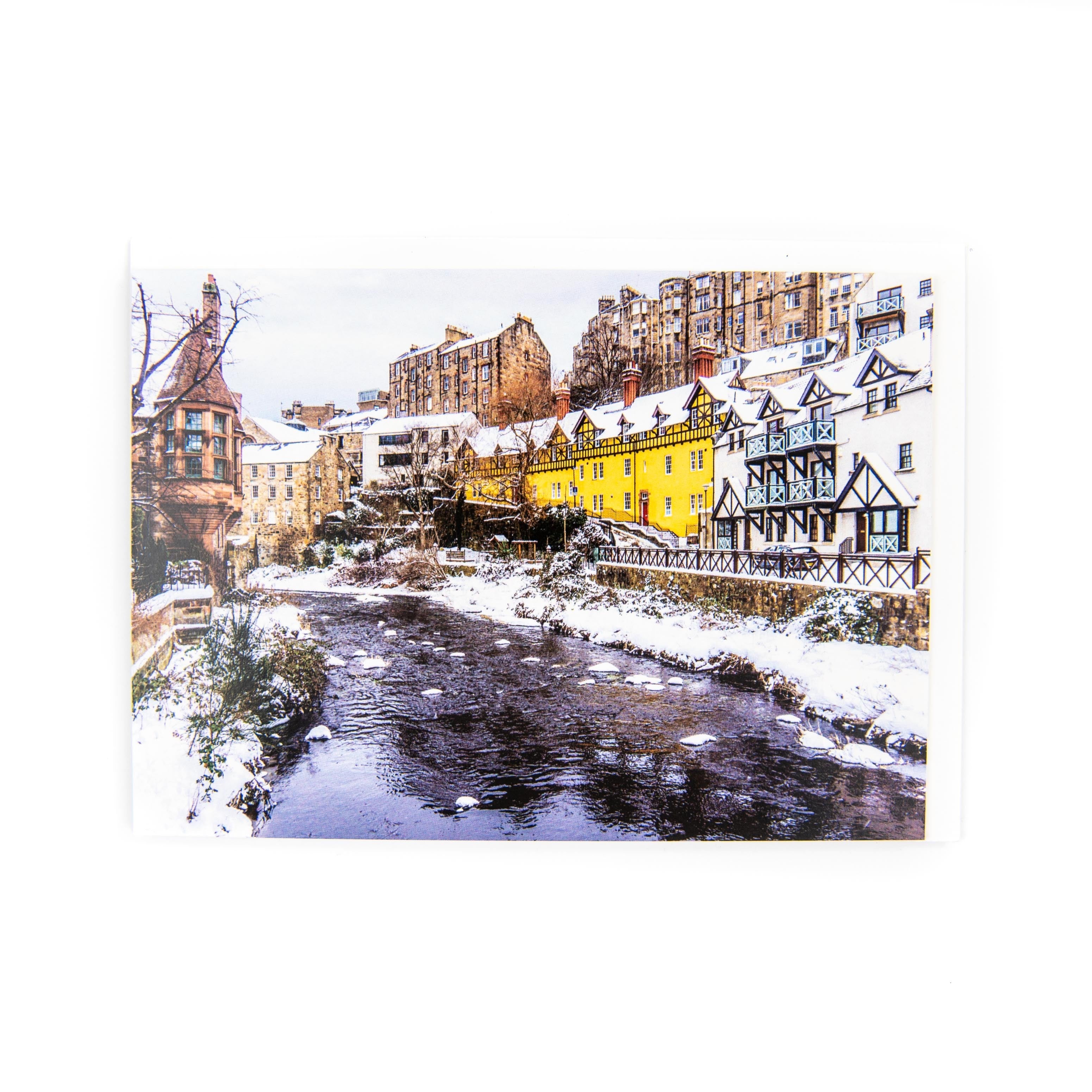 An image of Dean Village in the snow on a card.