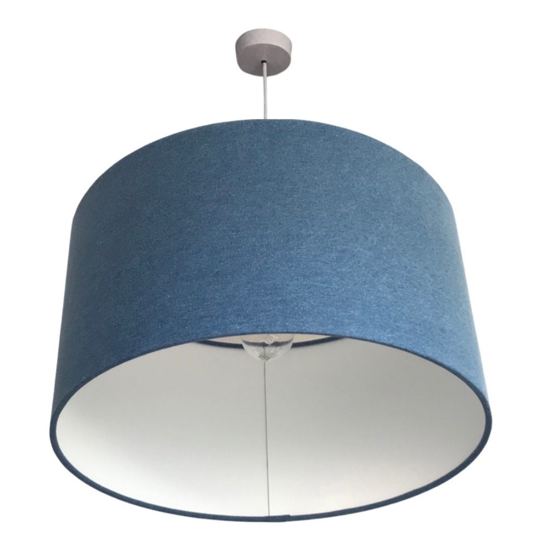 Drum lampshade covered in denim fabric