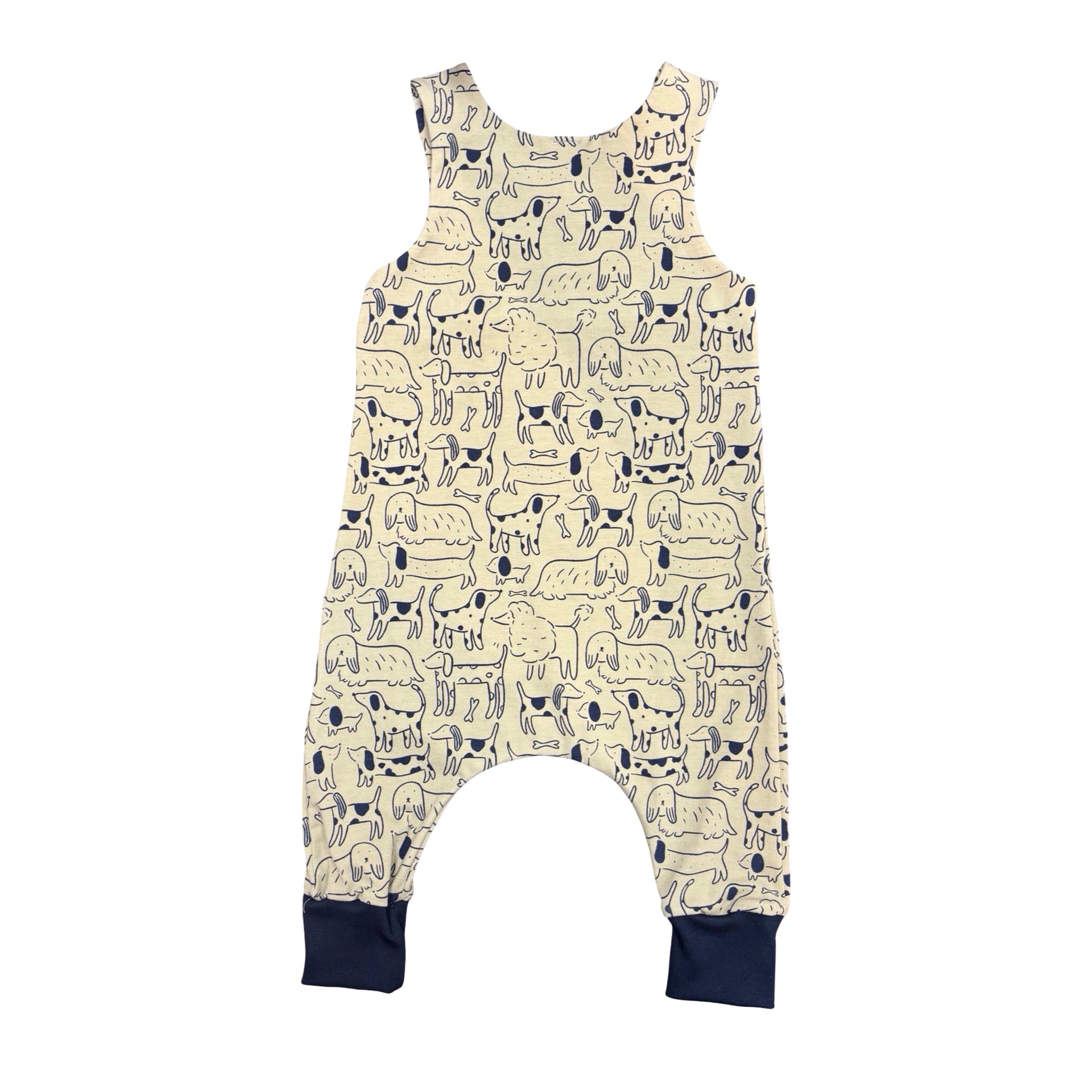 Children's romper with dog pattern on a white background.
