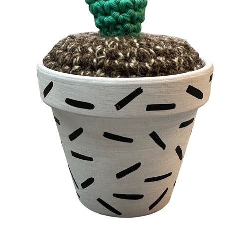 Handmade double stem crochet cactus in a white and black speckle painted terracotta pot. 