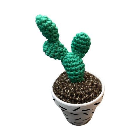 Handmade double stem crochet cactus in a white and black speckle painted terracotta pot. 