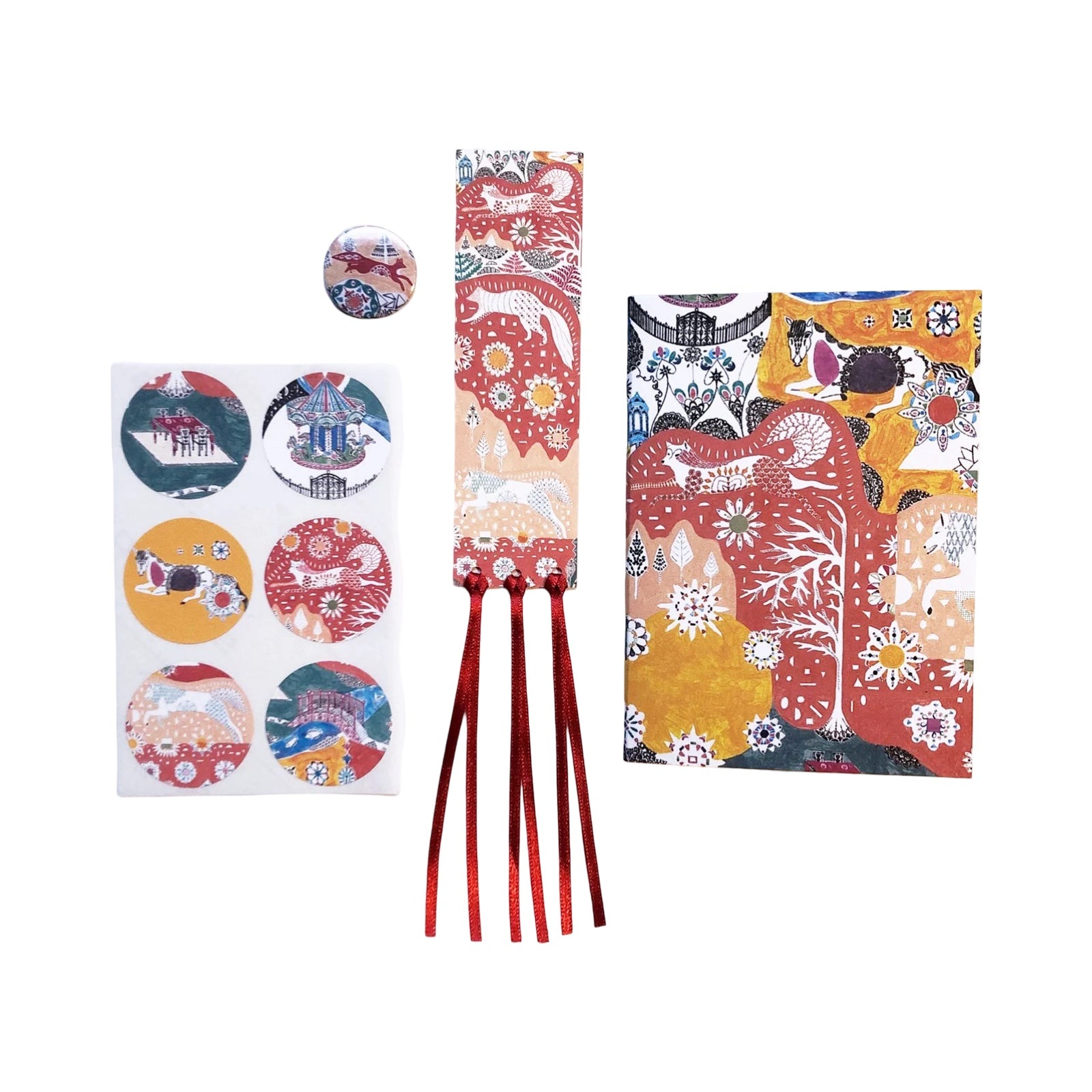 Colourful stationary items with animal patterns on a white background.