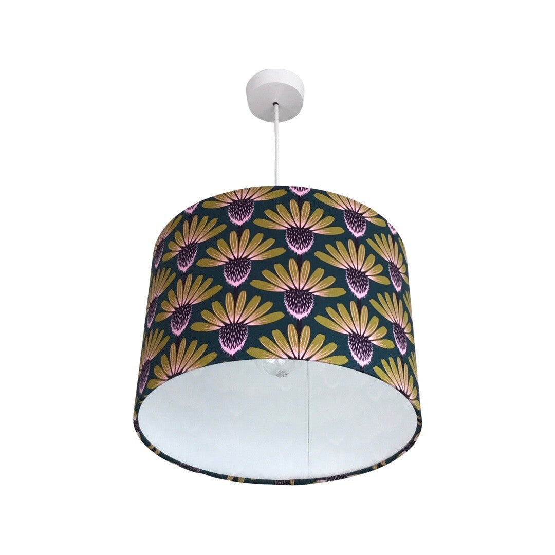 drum lampshade with mustard and purple echinacea flowers on a navy background.