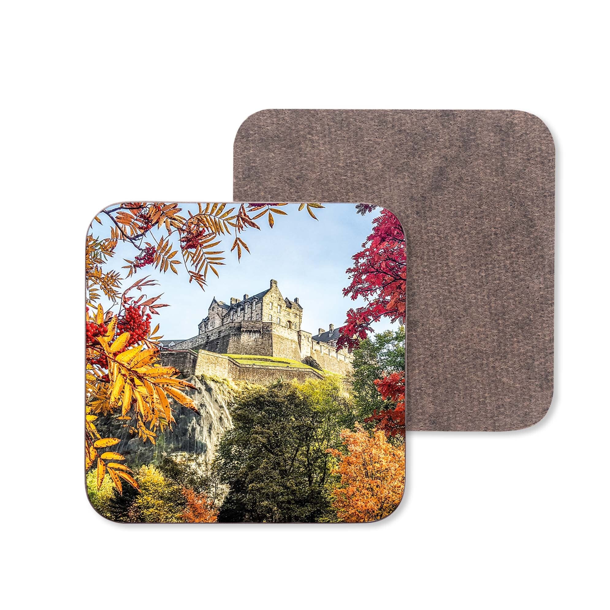 A picture of Edinburgh Castle surrounded by Autumn colours on a wooden coaster. 