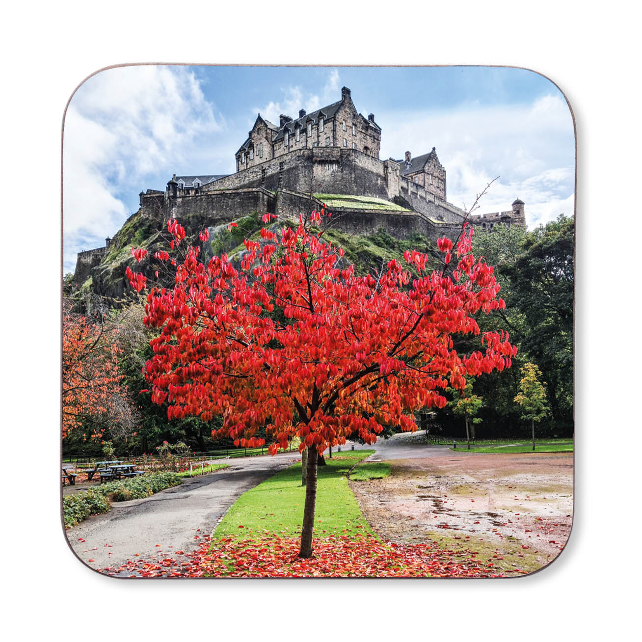 Coaster with a scenic design of Edinburgh Castle and a red tree.