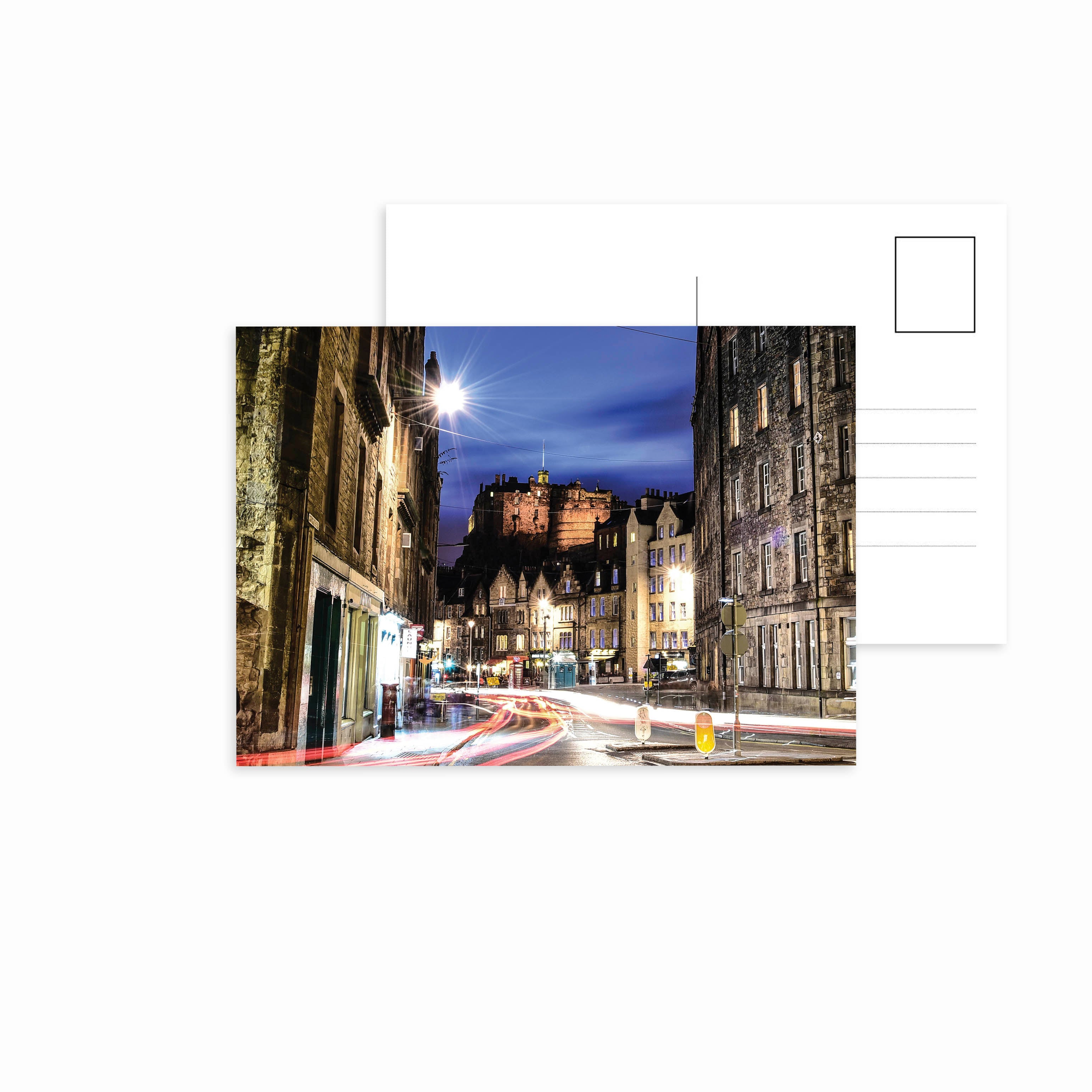 An image of Edinburgh Castle from Grassmarket on a postcard. 