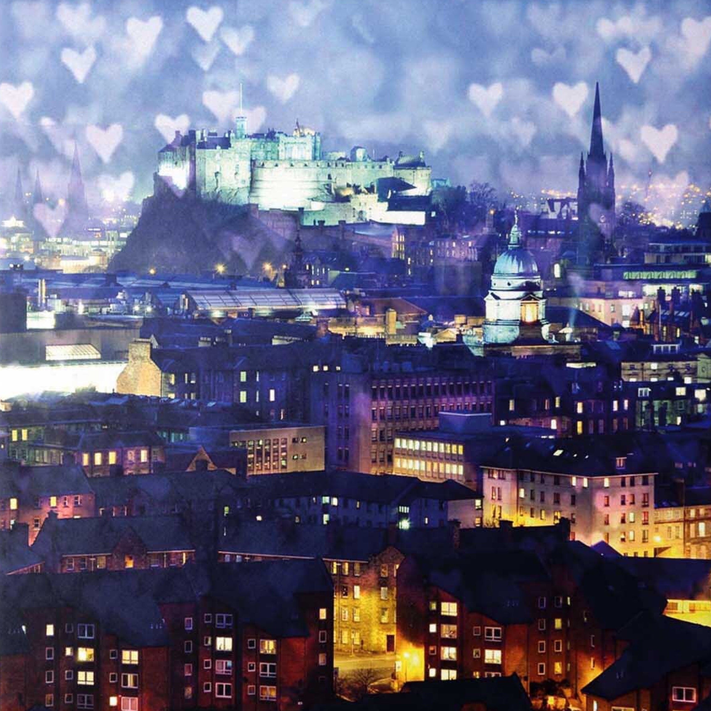 An image of Edinburgh Castle with love hearts in the sky.