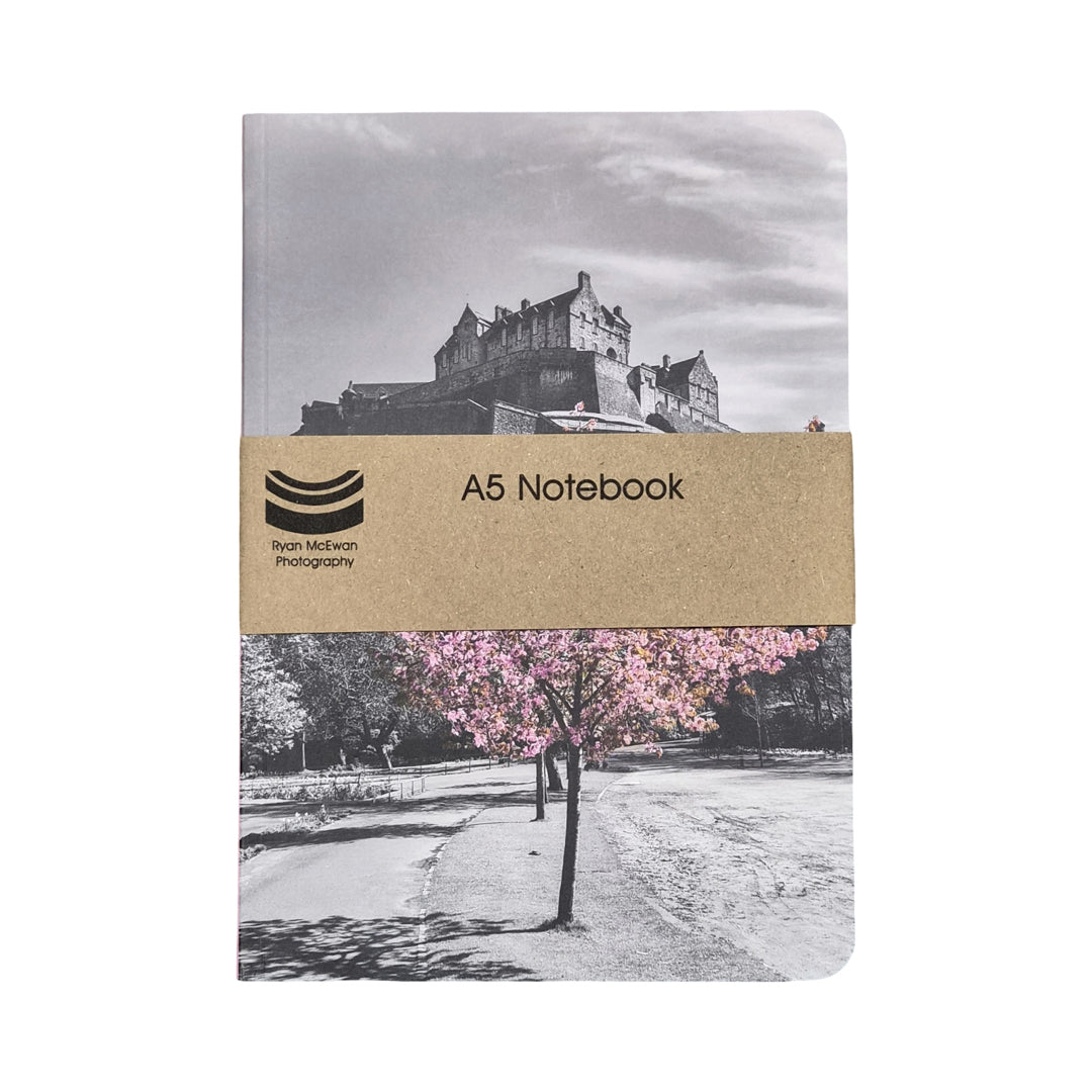 A5 notebook with a scenic cover design on a white background