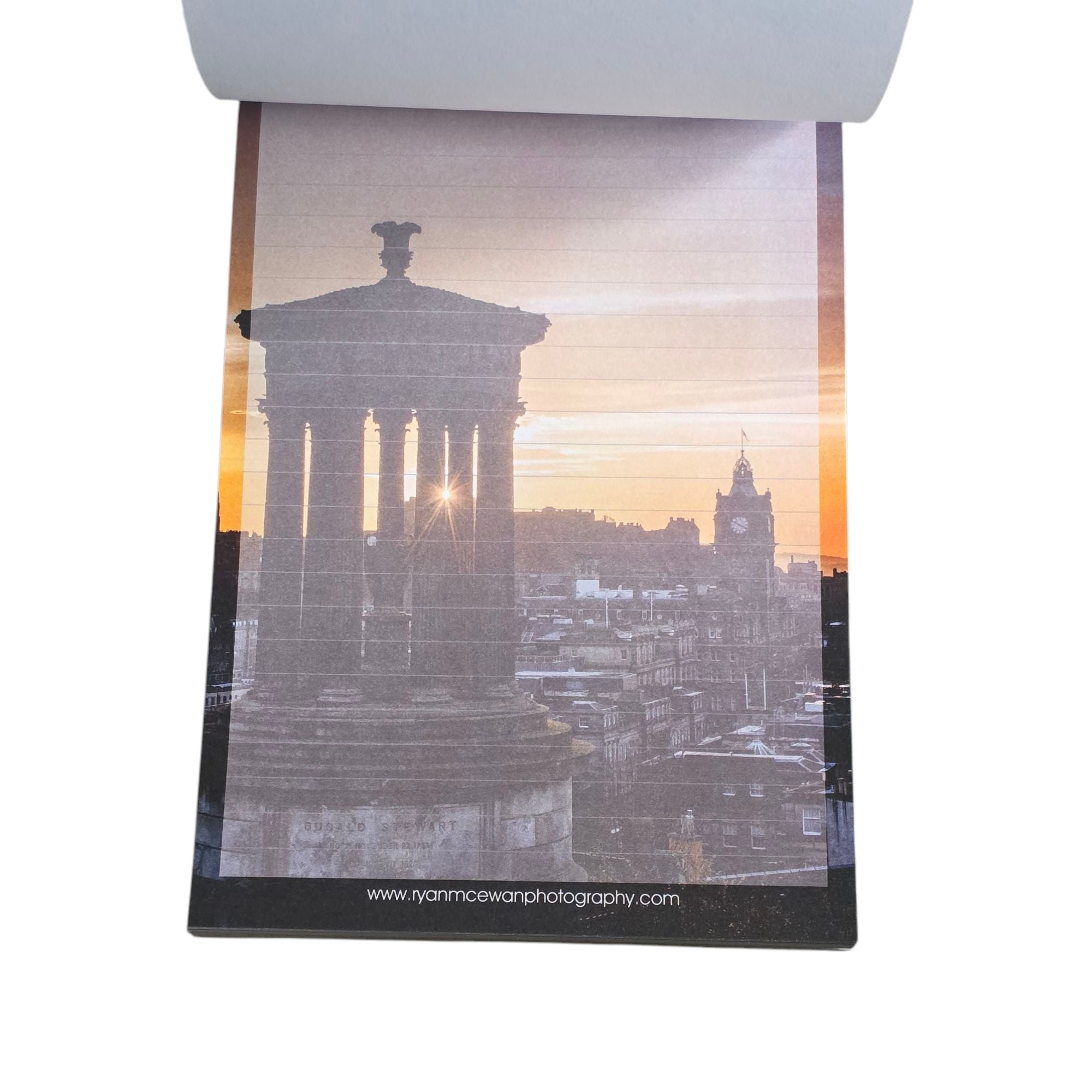 Yoga mat with a cityscape and sunset design