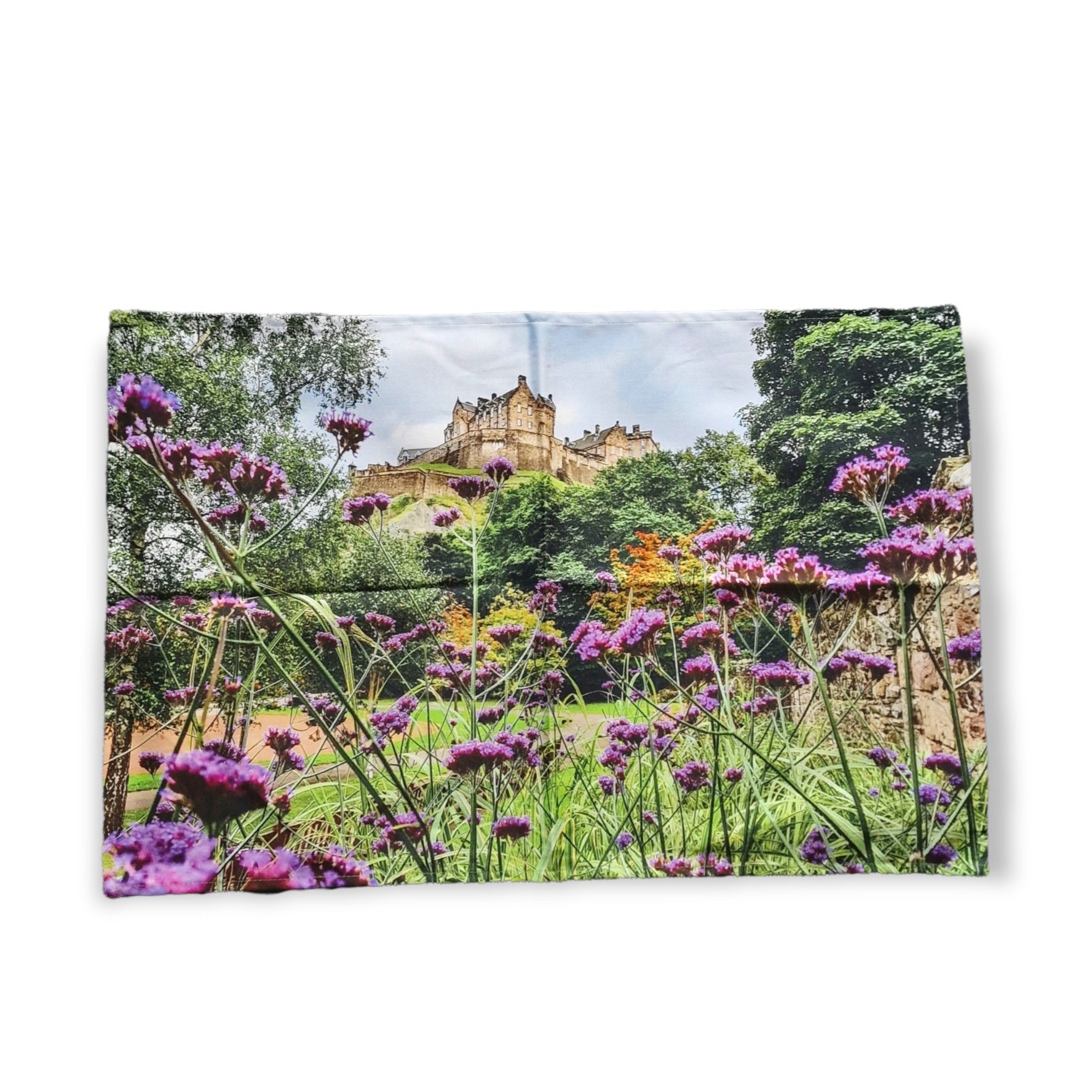 An image of Edinburgh Castle and purple Verbena flowers on a tea towel. 