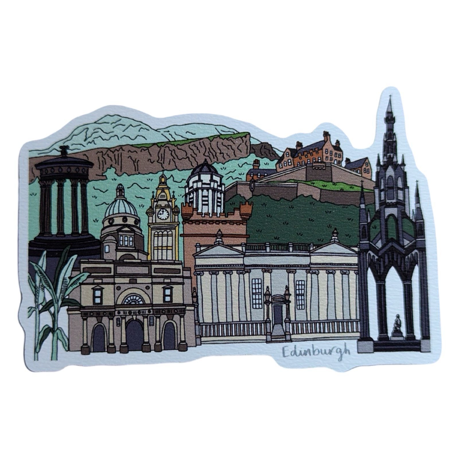 A laser-cut wooden magnet featuring a line drawing of Edinburgh's iconic buildings, including Edinburgh Castle and The Scott Monument.