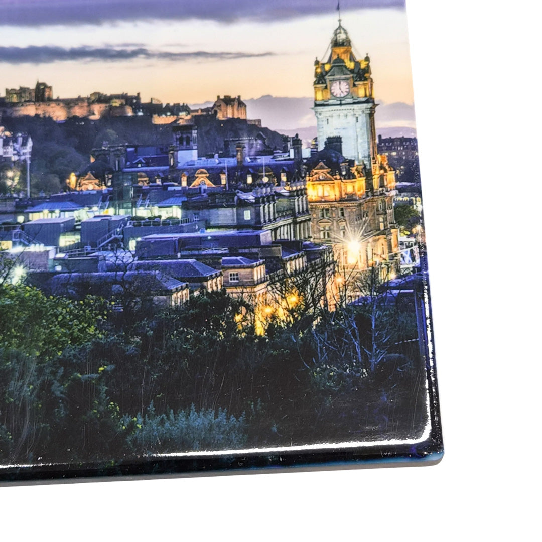 An image of a coaster with the Edinburgh Skyline on it. 