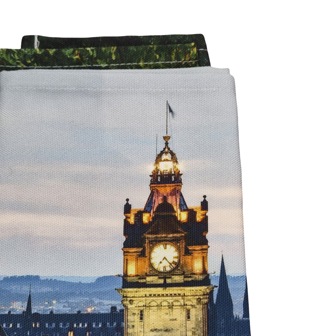 Towel with a clock tower design on a white background