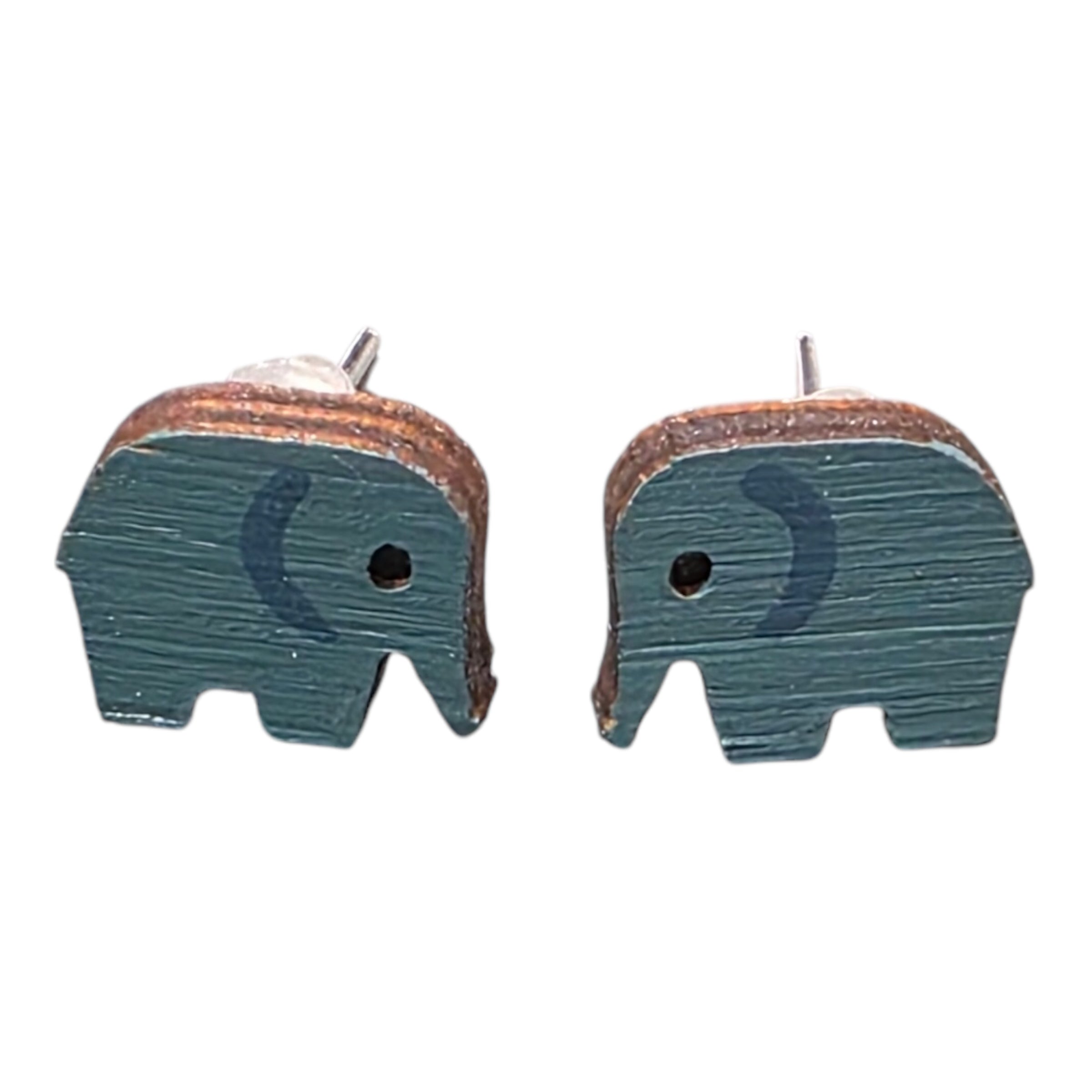 A pair of grey elephant-shaped wooden earrings.