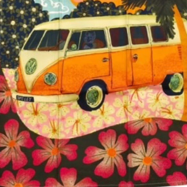 Volkswagen van on a floral background.