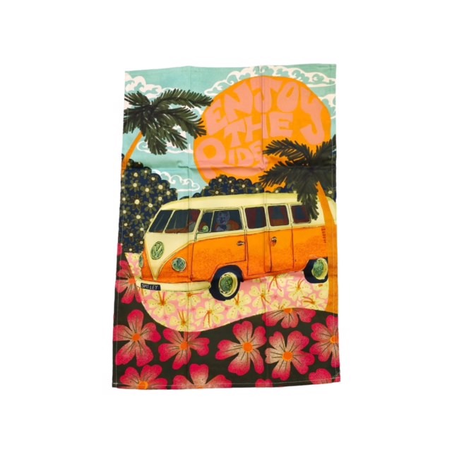 This tea towel is a digital illustration of a vintage VW cream and orange campervan surrounded by hills and palm trees.