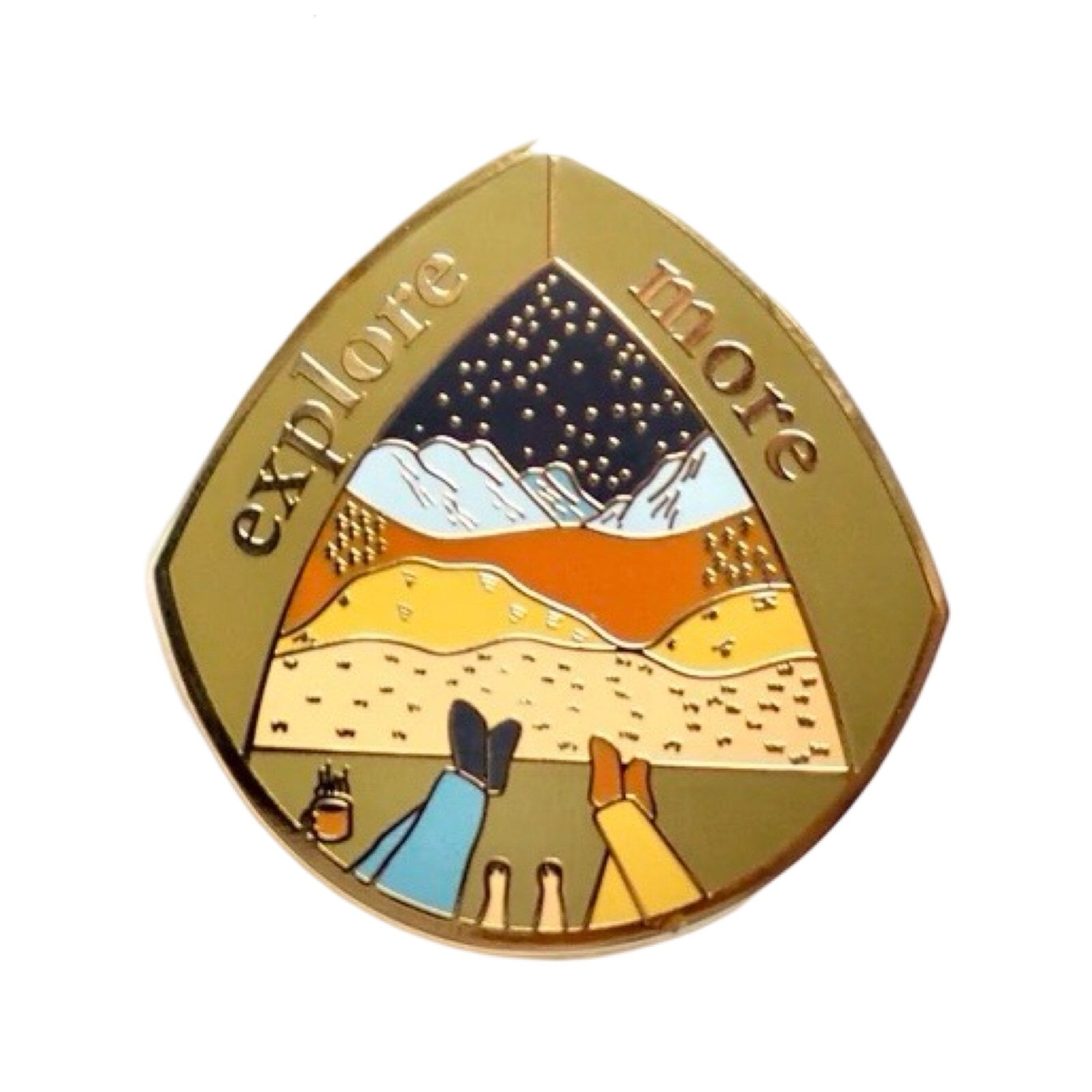 'Explore More' enamel pin badge, featuring an illustration of a couple and their dog looking out from their tent over mountains and getting ready to explore!