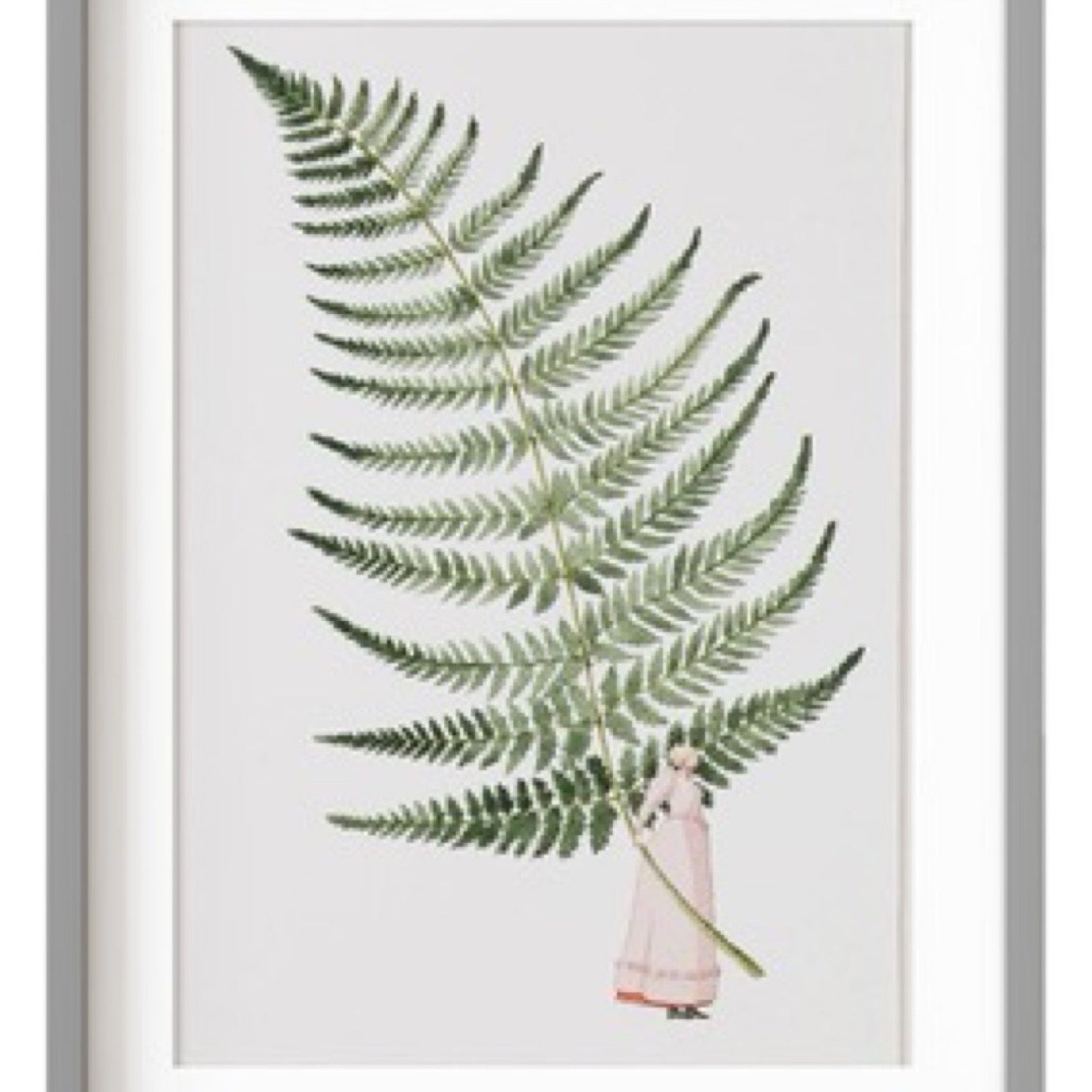 Framed artwork of a fern leaf held by a person in a pink dress on a white background.