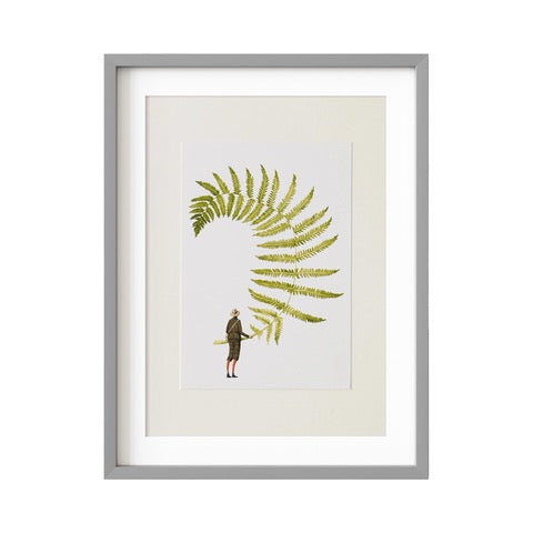 A print of a beautiful giant fern being held by a fabulously dressed gentleman.
