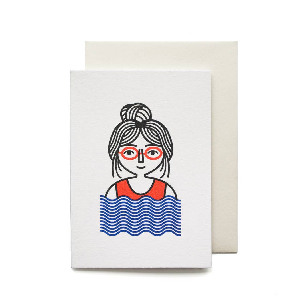 Greeting card with a design of a person wearing glasses and a swimsuit, standing in water.