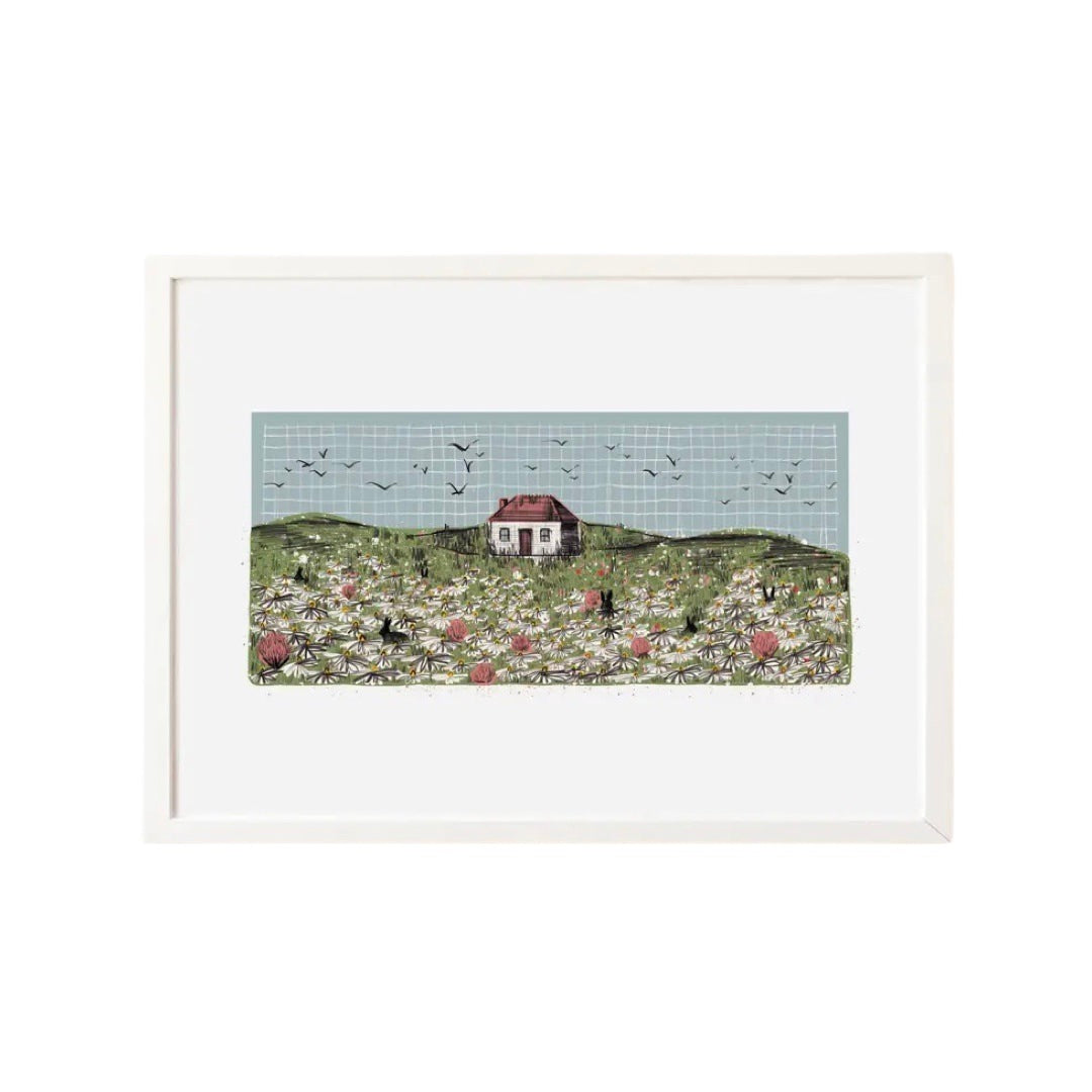 A calming print of a farmhouse in the meadow with daisies and rabbits in the foreground and birds circling overhead