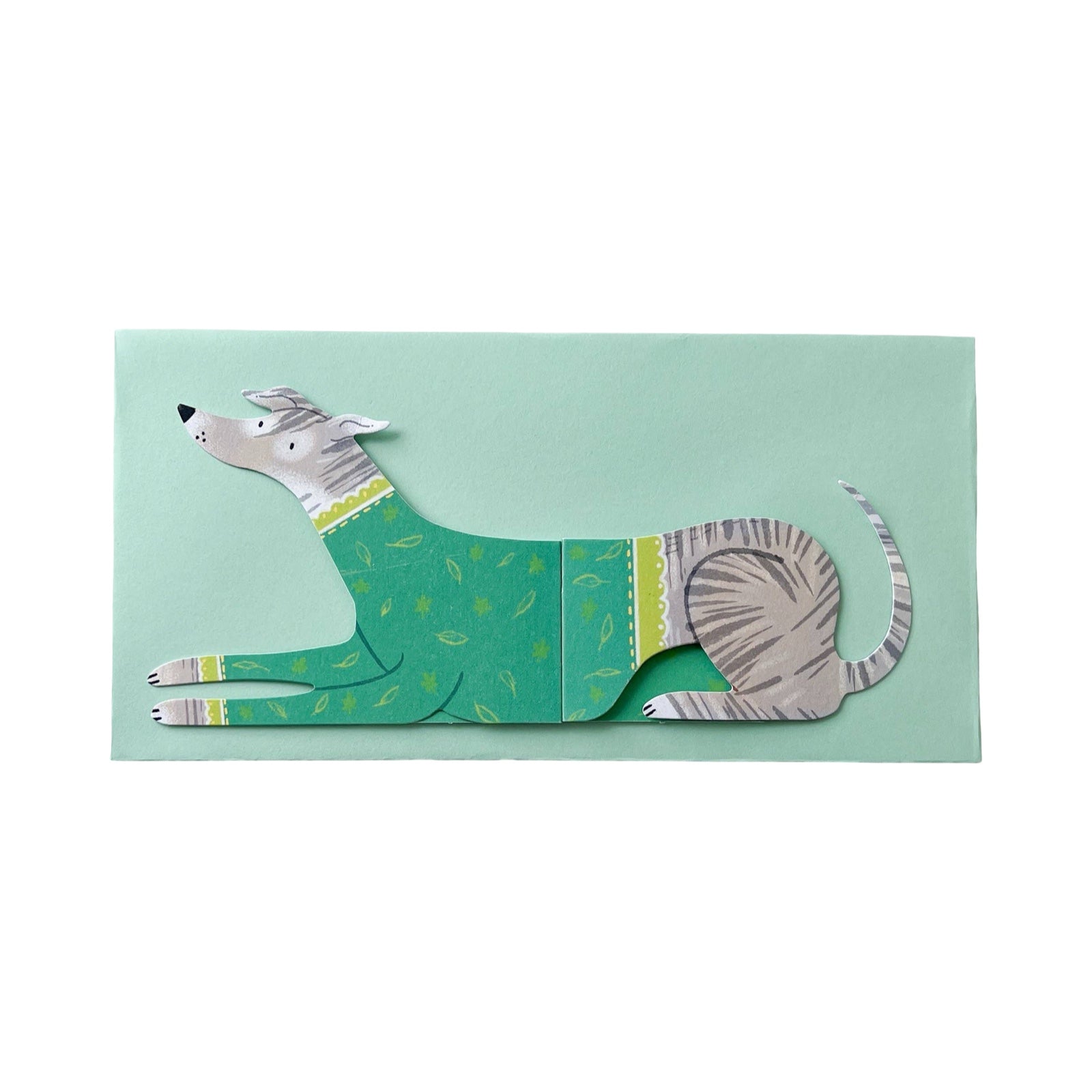 This dog-shaped card opens out to reveal a ridiculously long dog! 'Fern' is wearing a green jumper with lime green cuffs. 