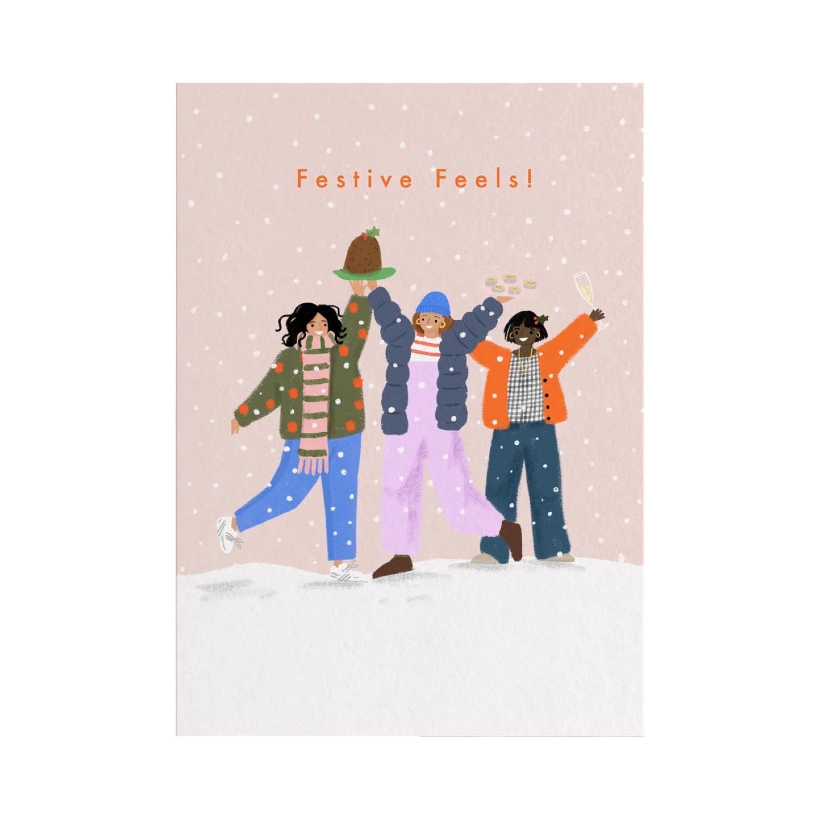A festive greeting card featuring an illustration of three women in winter clothing celebrating in the snow, with the text 'Festive Feels!' at the top on a light pink background.