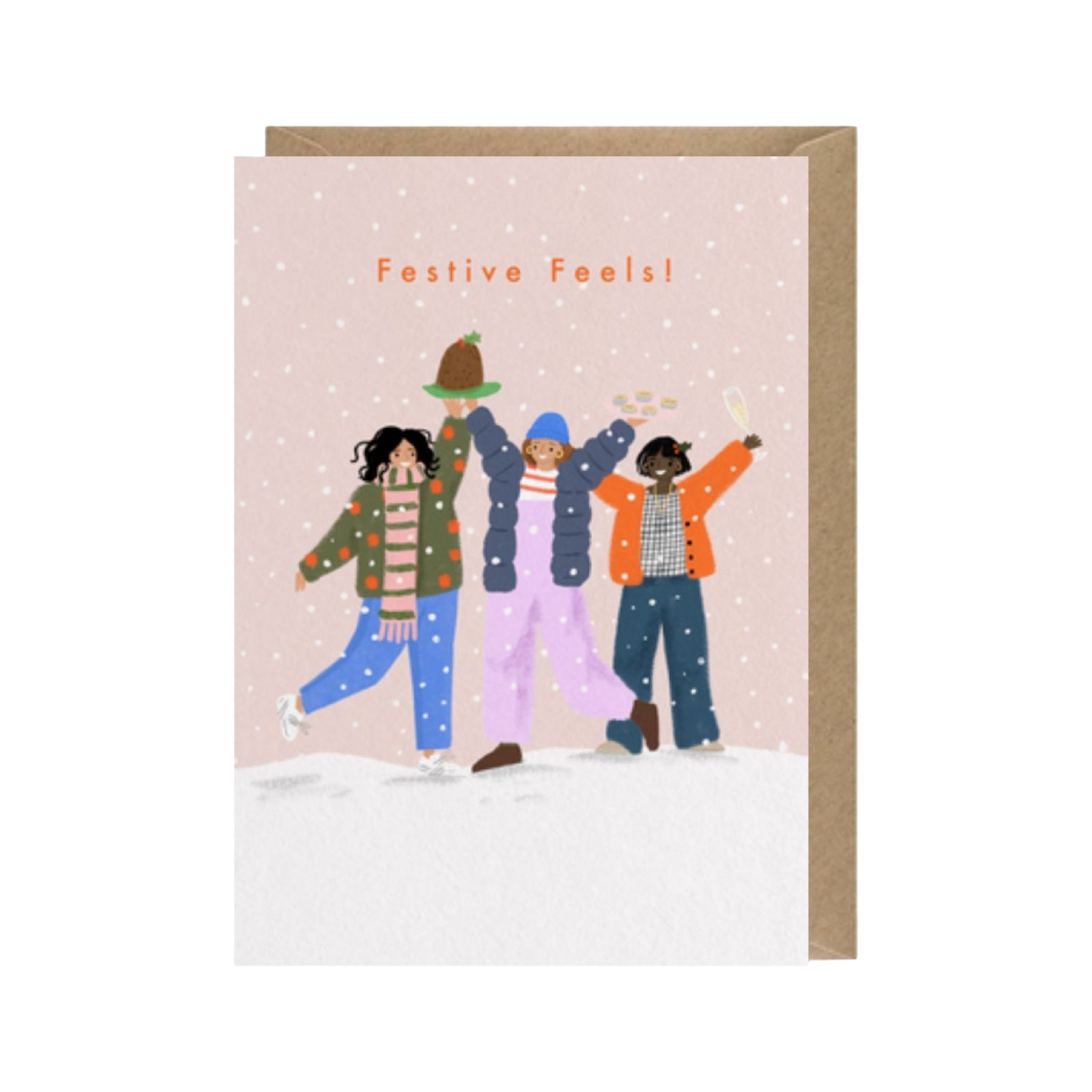 A greeting card with a kraft envelope, featuring an illustration of three people in winter clothing standing in the snow with the text 'Festive Feels!' at the top.