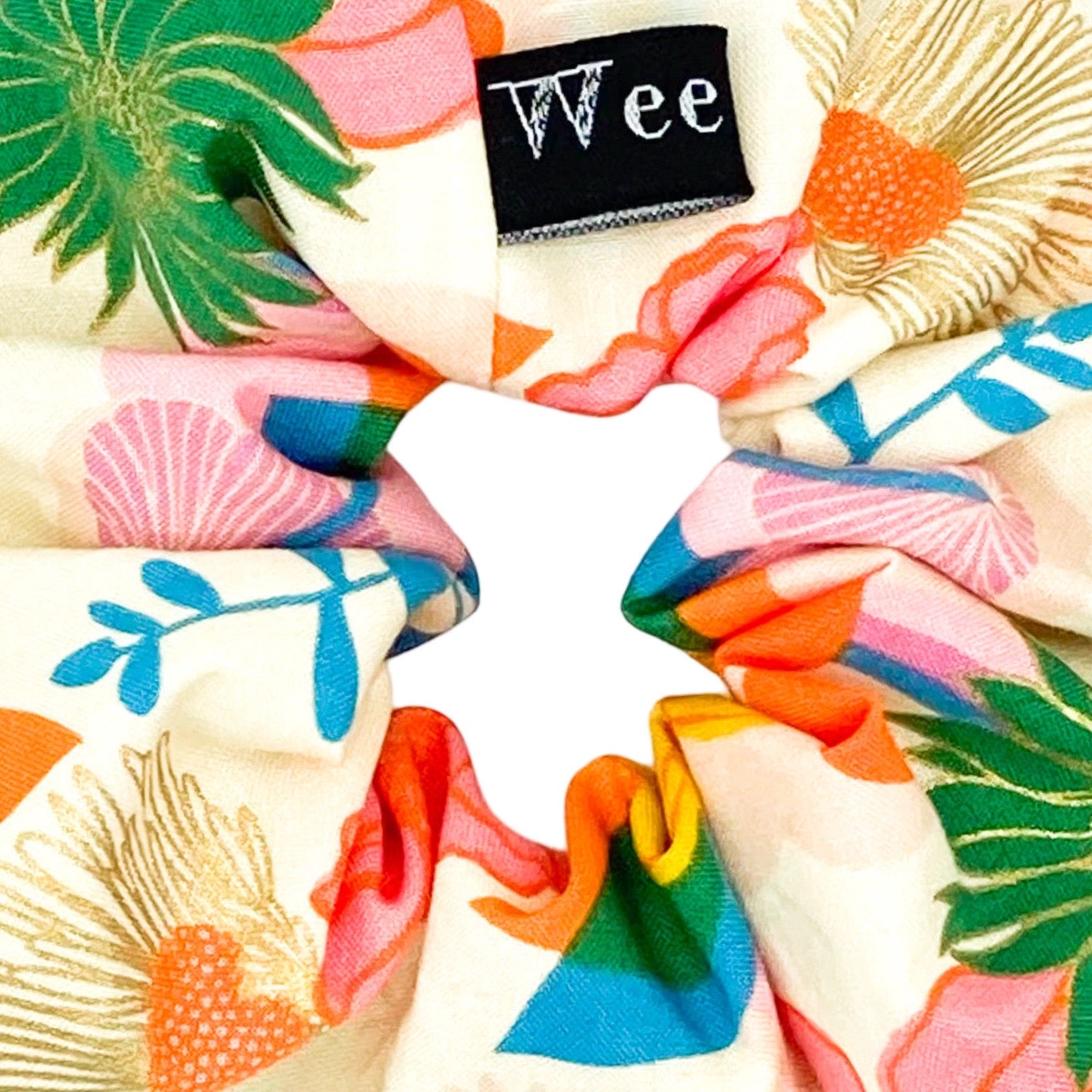 Handmade floral hair scrunchies in bold colours made from 100% cotton fabrics.
