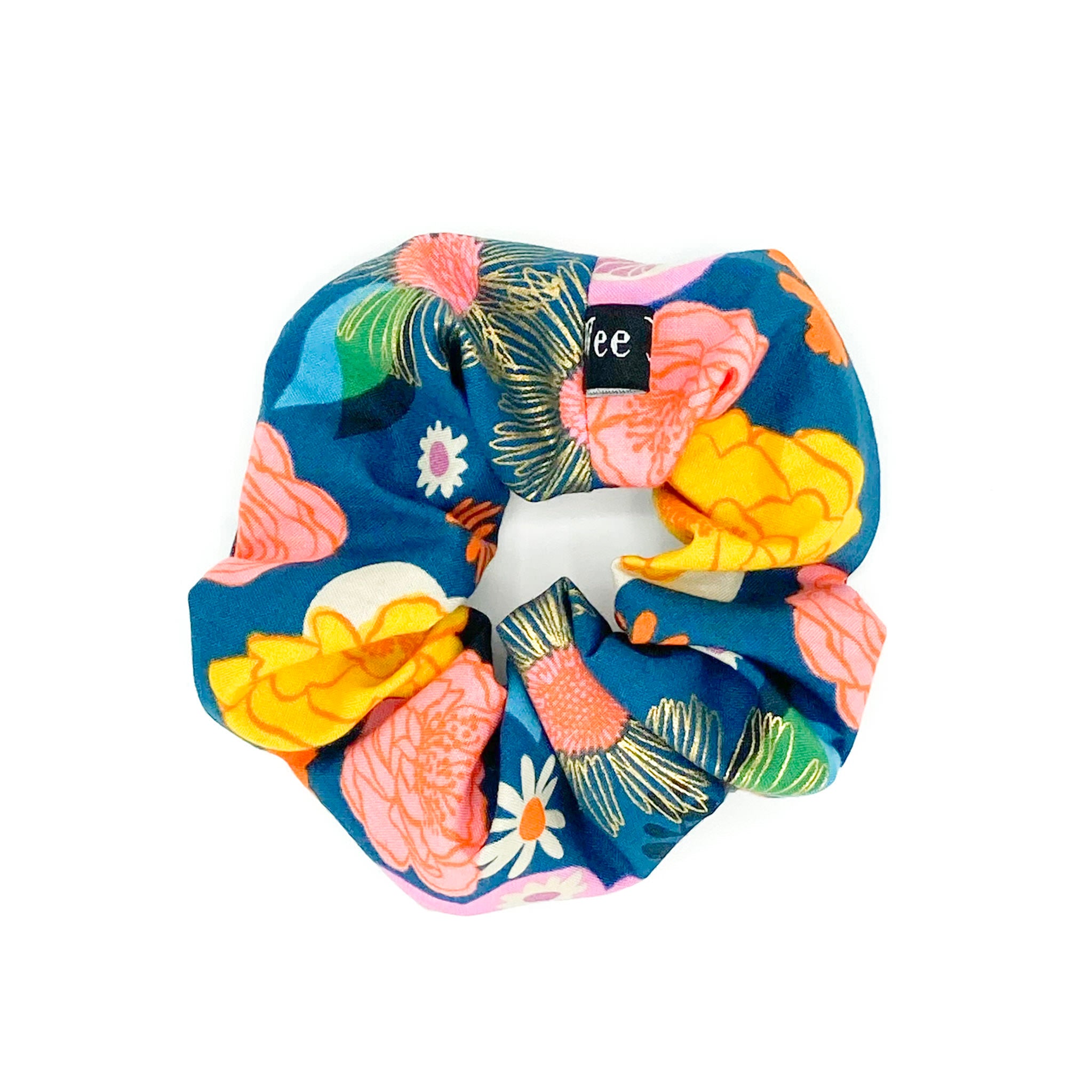 Handmade floral hair scrunchies in bold colours made from 100% cotton fabrics.