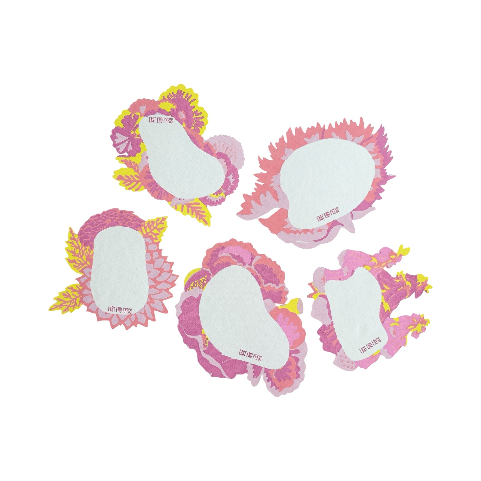 The back of 5 floral shaped notecards showing the white panels to write on.