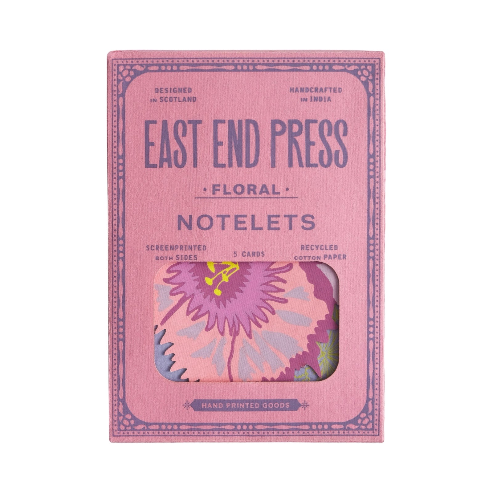 A pink rectangular paper packet of floral notecards.