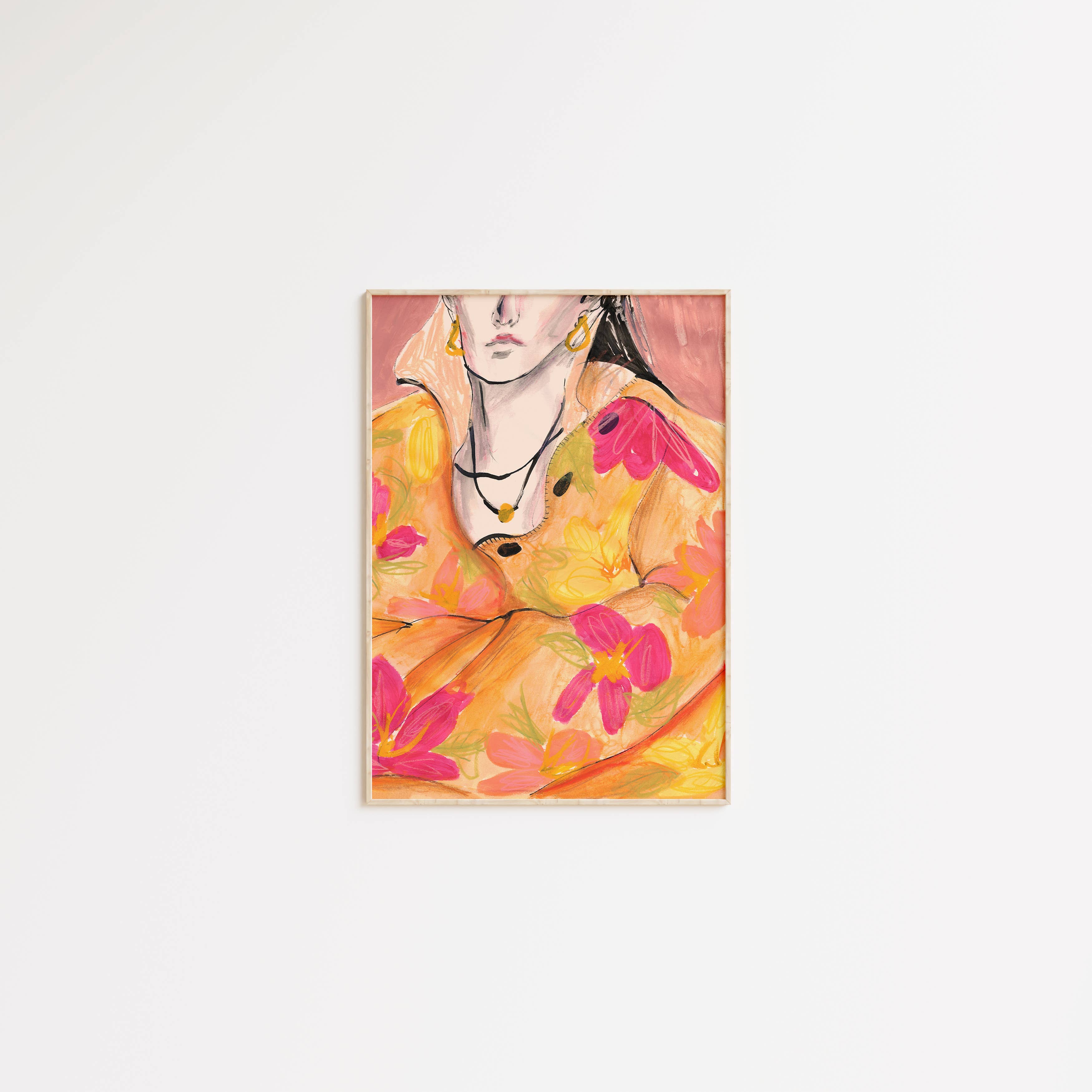 A framed vertical art print featuring a stylized portrait of a woman in a yellow and pink floral dress, displayed against a clean white wall.
