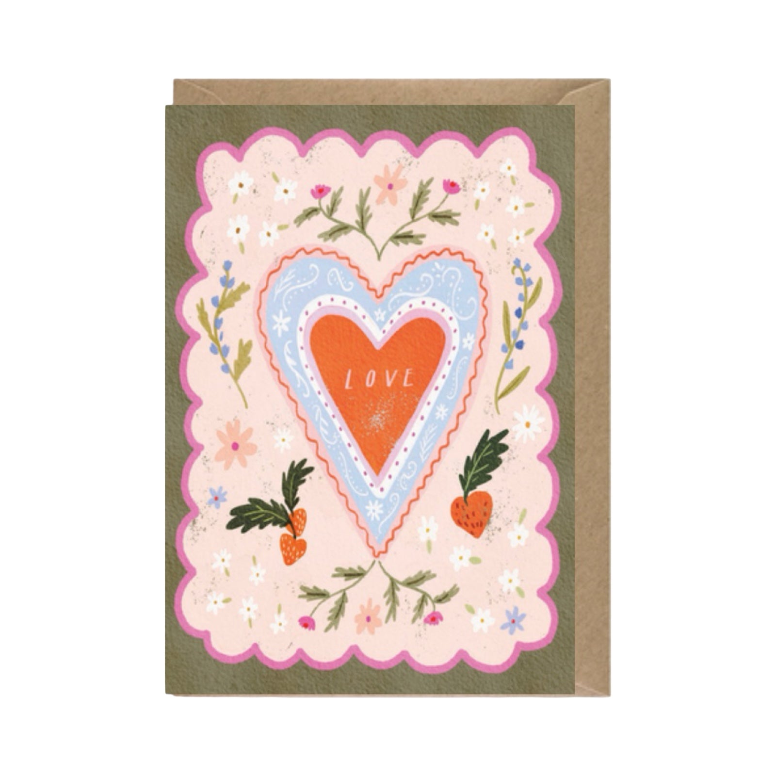 A square greeting card with an envelope behind it, featuring a decorative floral heart design. The card has a muted olive green border, a pink scalloped frame, a light blue heart, and an orange heart in the centre with the word 'LOVE' written on it.