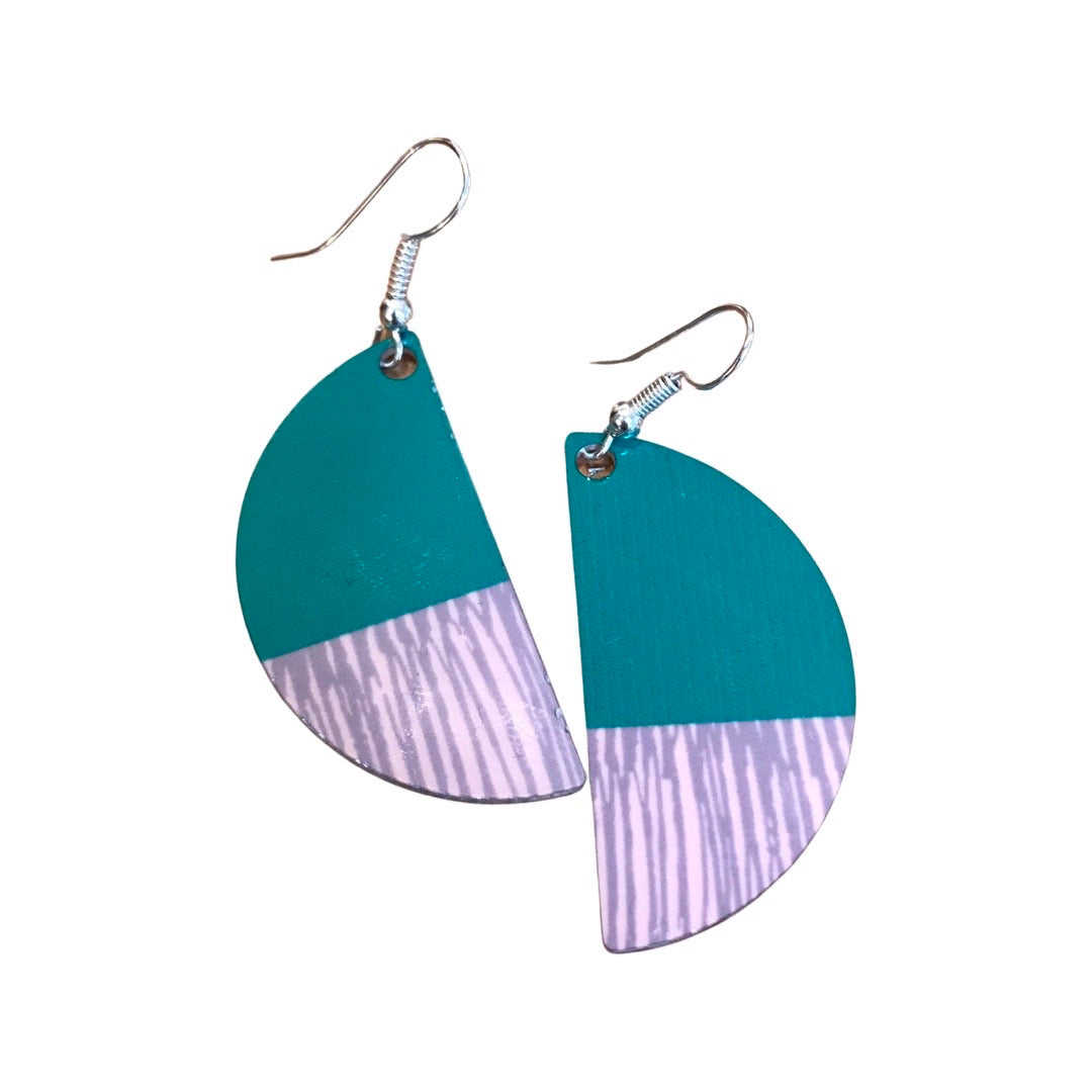 Teal and purple earrings on a white background.