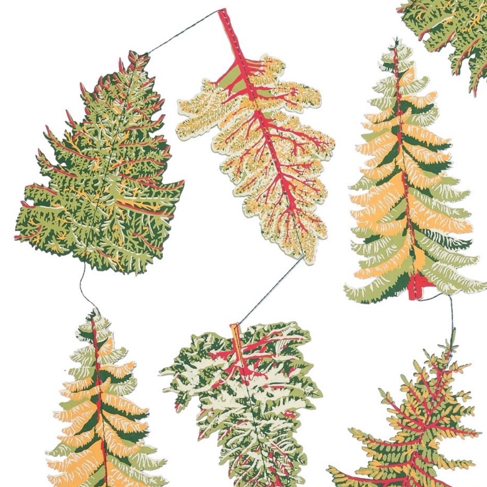 Decorative leaf-shaped ornaments on a white background.