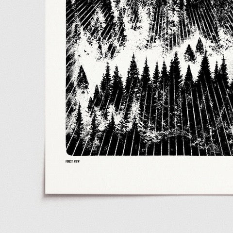 Black and white print featuring a forest in the winter, with a mustard-coloured moon in the sky and flying birds.
