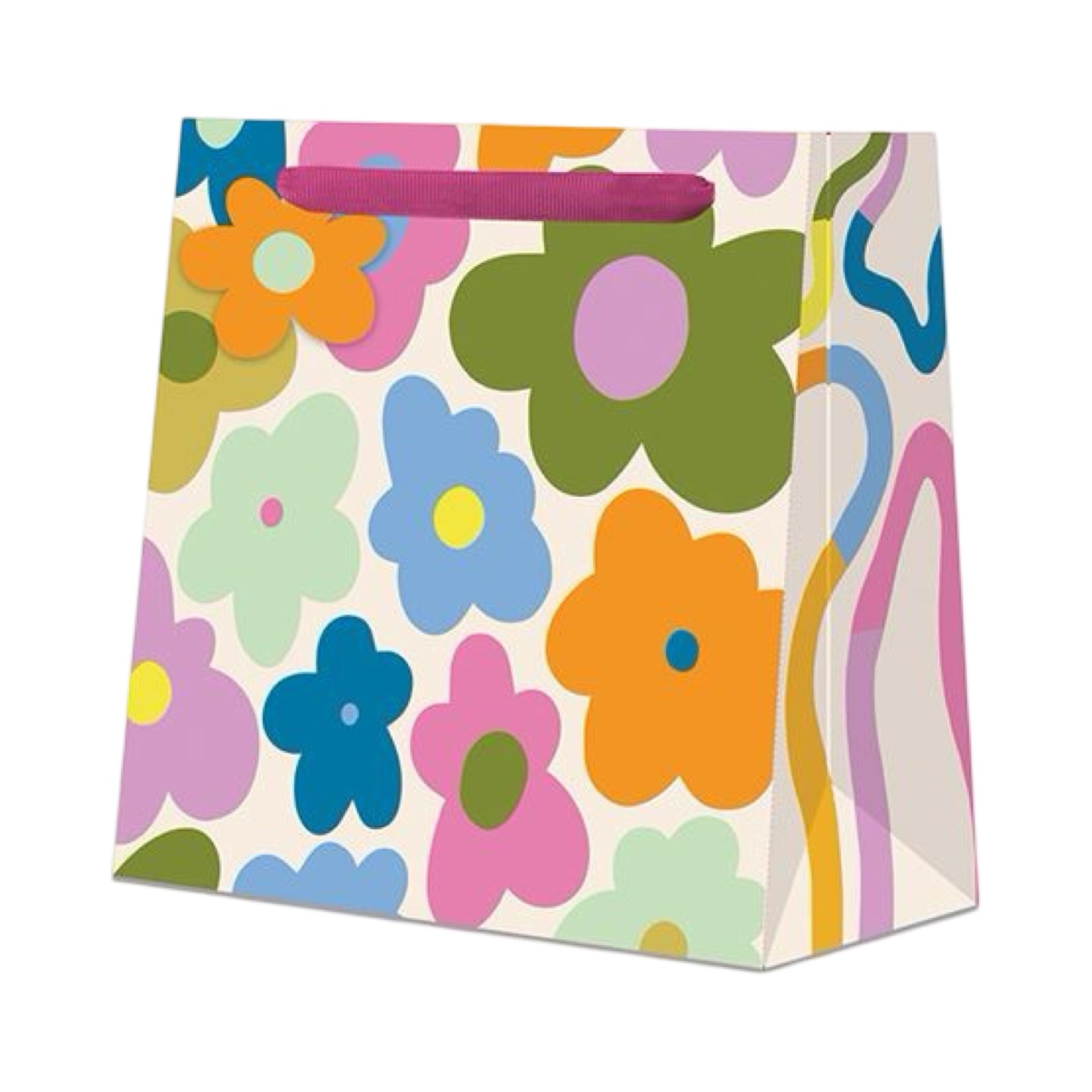 Colourful gift bag with bright, bold multicoloured flowers against a white background, a pink ribbon handle and an orange flower gift tag.