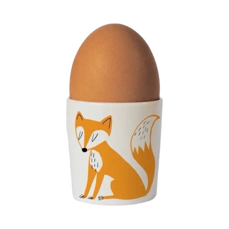 Bone china egg cup with an illustration of an orange fox on the front.